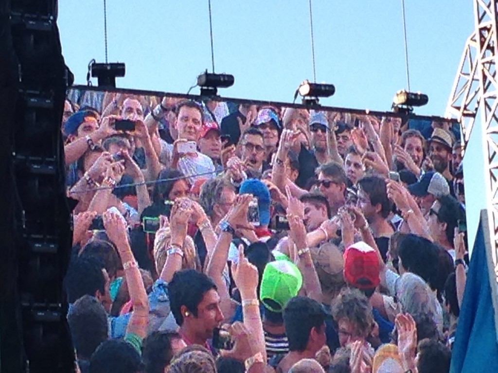 Look to the left of the guy in the blue baseball hat, it's Matt from The National who unexpectedly jumped in the crowd!