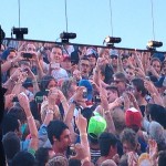 Look to the left of the guy in the blue baseball hat, it's Matt from The National who unexpectedly jumped in the crowd!